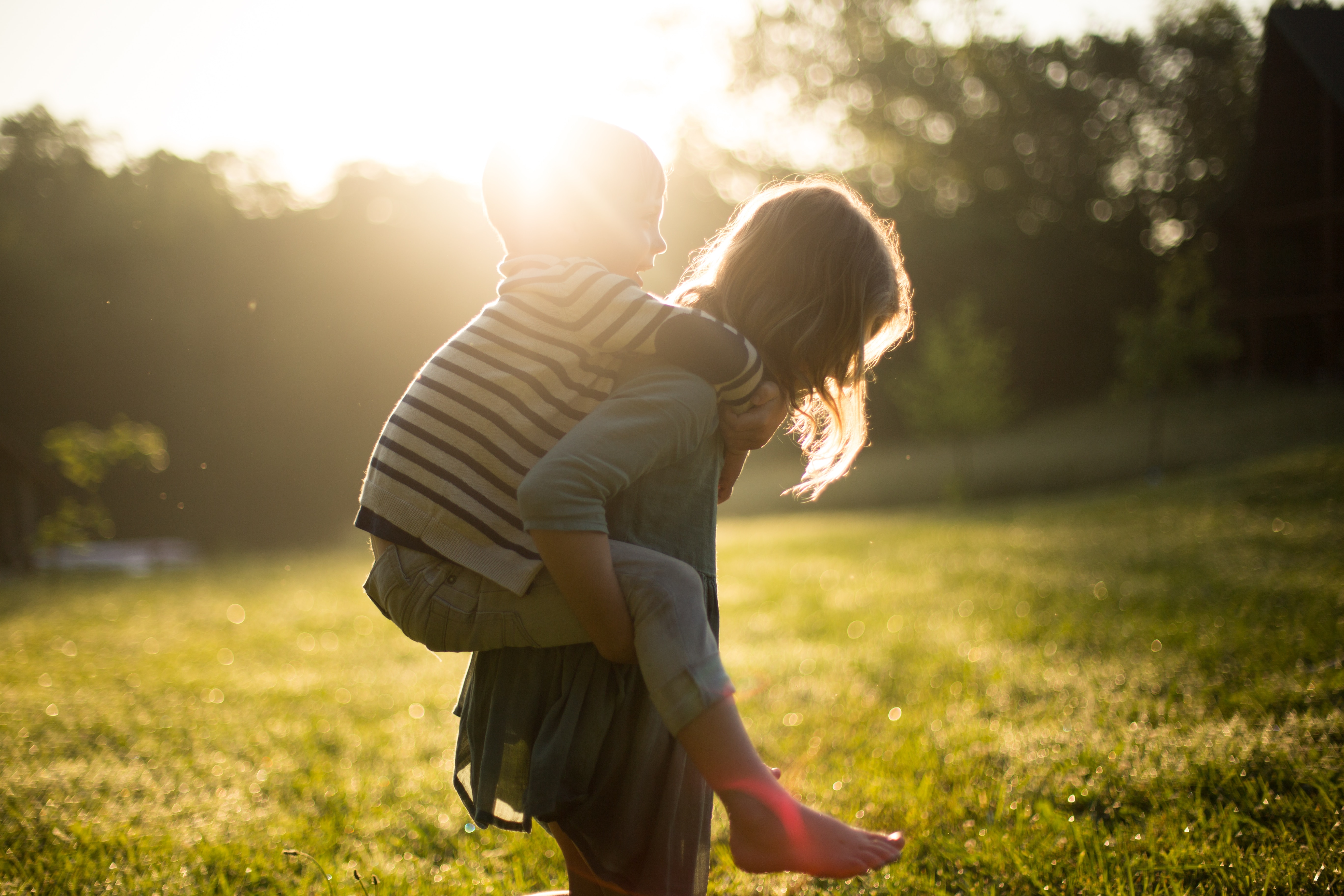 A child piggy backing another child